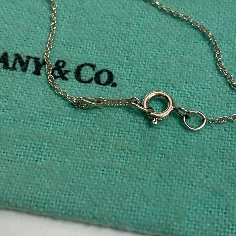 Tiffany & Co. Paloma Picasso Top Cross Kiss Necklace Silver 925