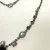 NICKY BUTLER STERLING UNUSUAL FESTOON DRAPE MOONSTONE, GARNET 17 NECKLACE