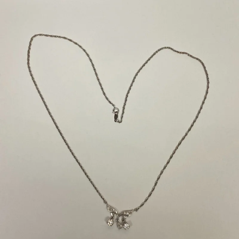 Diamond Pendant With A Neck Chain. Mounting is Made of 14 Kt Gold