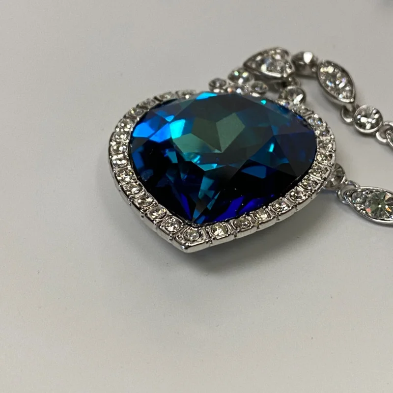 Heart-Shaped Blue Glass Pendant Necklace with Silver-Tone Chain - Elegant Design