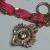 Juicy Couture Gold Tone Link With Charm Pink Lace Bracelet