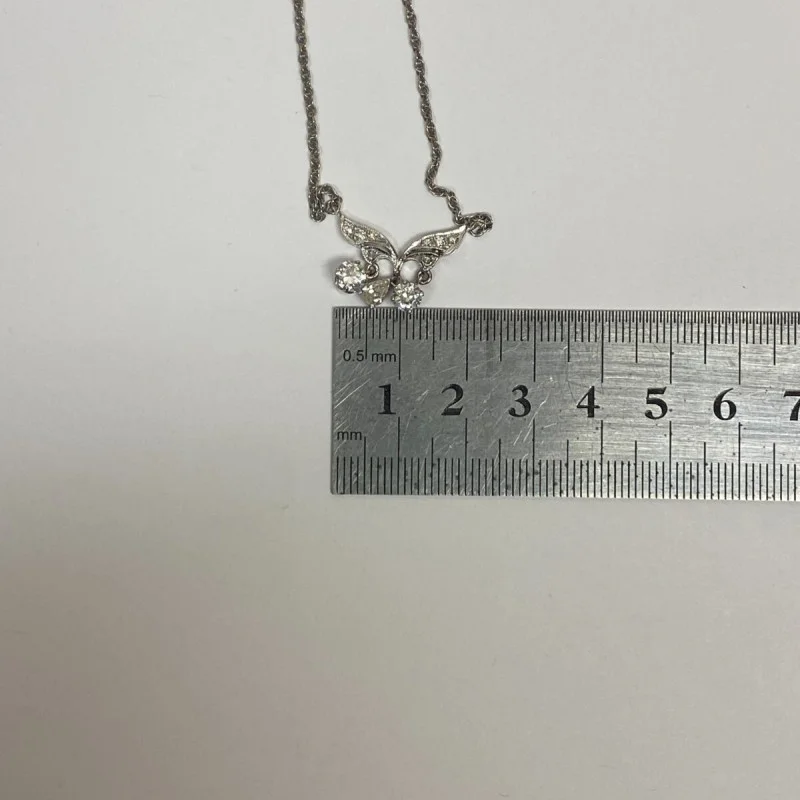 Diamond Pendant With A Neck Chain. Mounting is Made of 14 Kt Gold