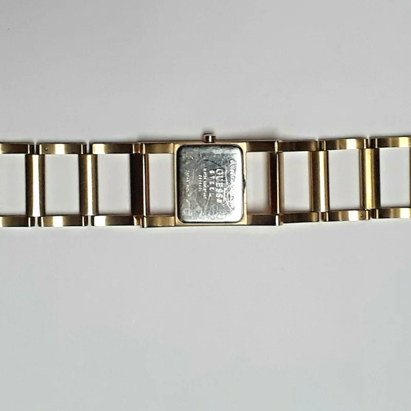 GUESS GOLD TONE WATCH GUESS STEEL WATER RESISTANT JAPAN MOVT