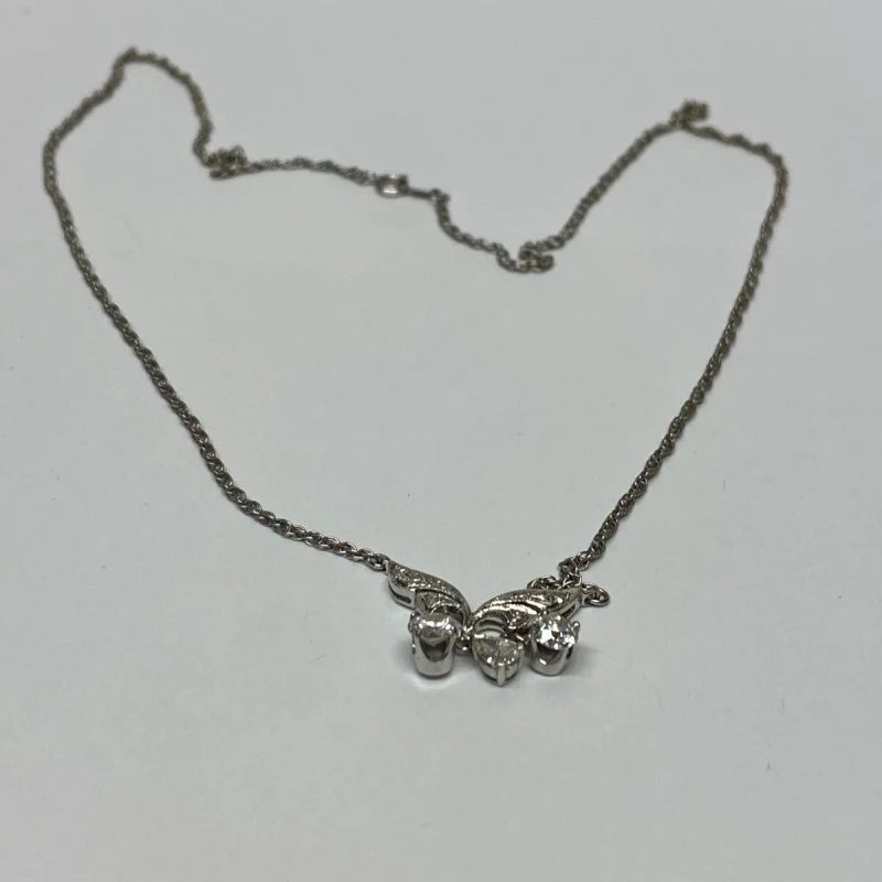 Diamond Pendant With A Neck Chain. Mounting is Made of 14 Kt Gold