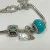 Judith Ripka Silver 925 CZ Charms Bracelet Size 7.5” Long, 7 pieces, Pouch, Box