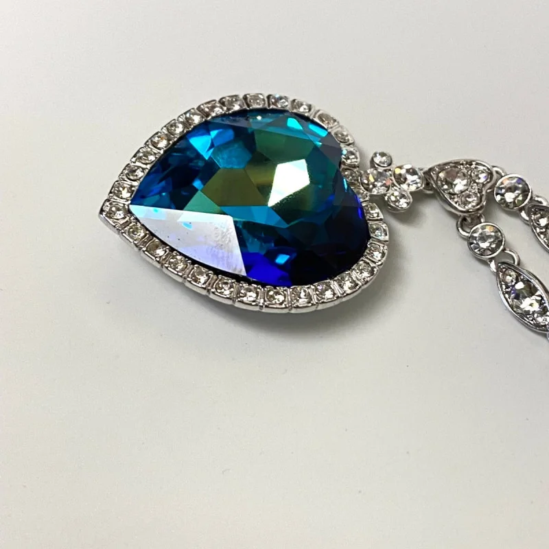 Heart-Shaped Blue Glass Pendant Necklace with Silver-Tone Chain - Elegant Design