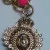 Juicy Couture Gold Tone Link With Charm Pink Lace Bracelet