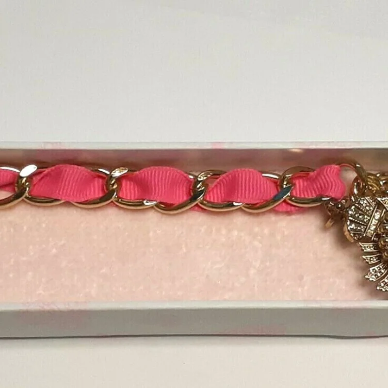 Juicy Couture Gold Tone Link With Charm Pink Lace Bracelet