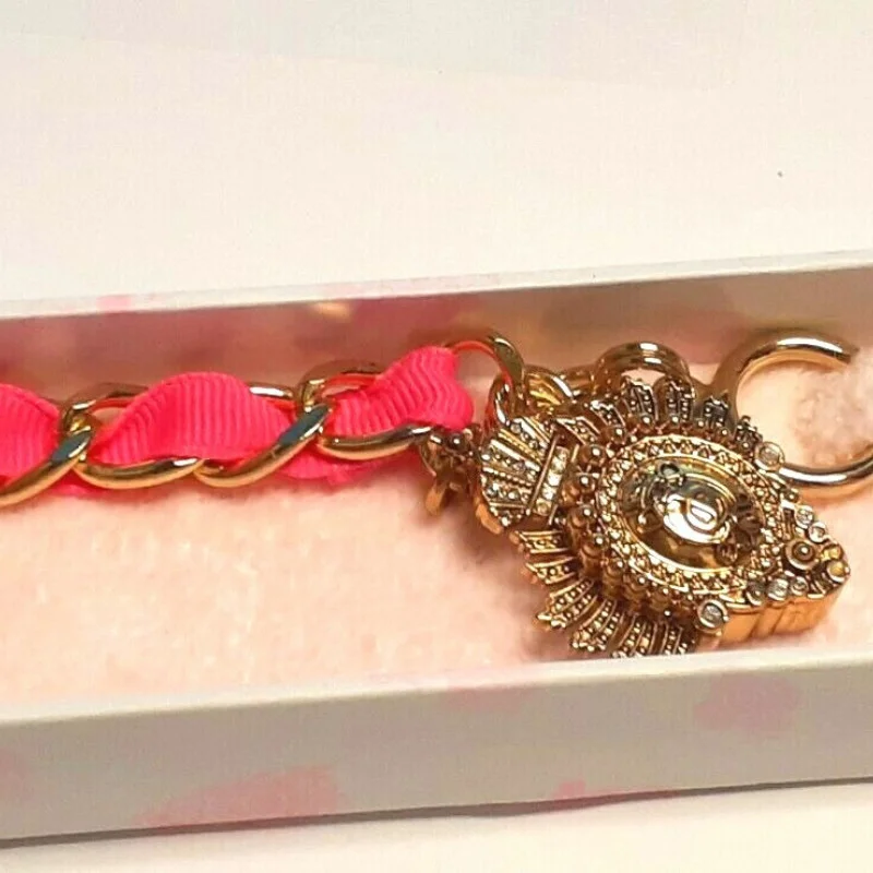 Juicy Couture Gold Tone Link With Charm Pink Lace Bracelet