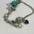 Judith Ripka Silver 925 CZ Charms Bracelet Size 7.5” Long, 7 pieces, Pouch, Box