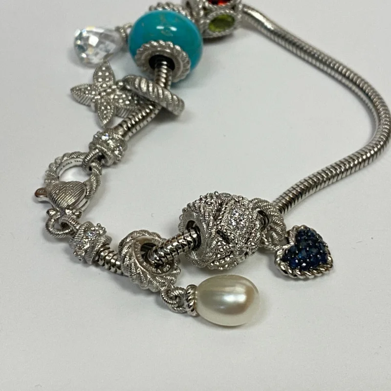 Judith Ripka Silver 925 CZ Charms Bracelet Size 7.5” Long, 7 pieces, Pouch, Box