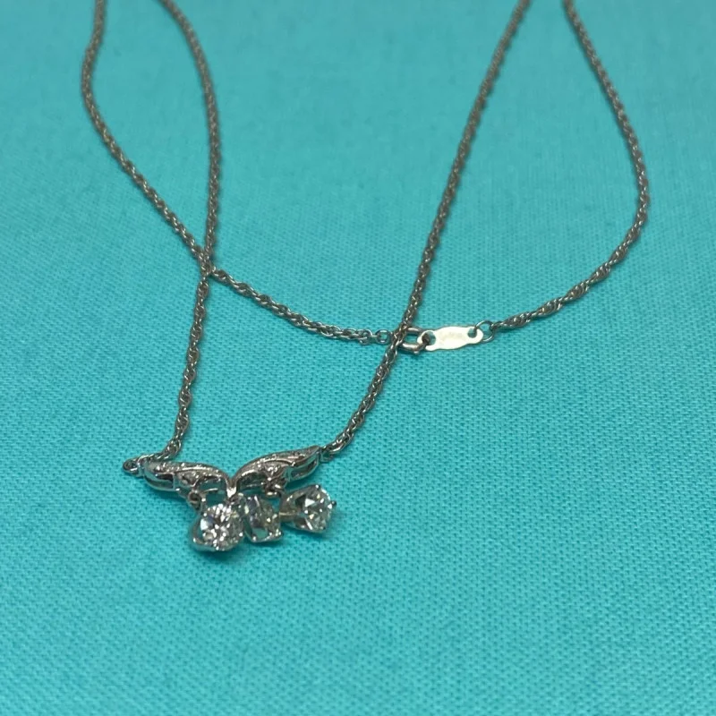 Diamond Pendant With A Neck Chain. Mounting is Made of 14 Kt Gold