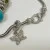 Judith Ripka Silver 925 CZ Charms Bracelet Size 7.5” Long, 7 pieces, Pouch, Box