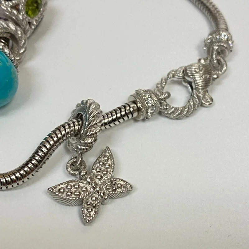 Judith Ripka Silver 925 CZ Charms Bracelet Size 7.5” Long, 7 pieces, Pouch, Box