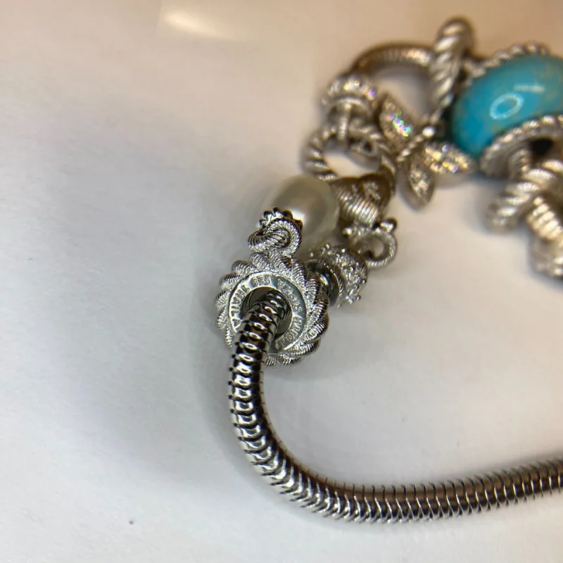 Judith Ripka Silver 925 CZ Charms Bracelet Size 7.5” Long, 7 pieces, Pouch, Box
