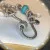 Judith Ripka Silver 925 CZ Charms Bracelet Size 7.5” Long, 7 pieces, Pouch, Box