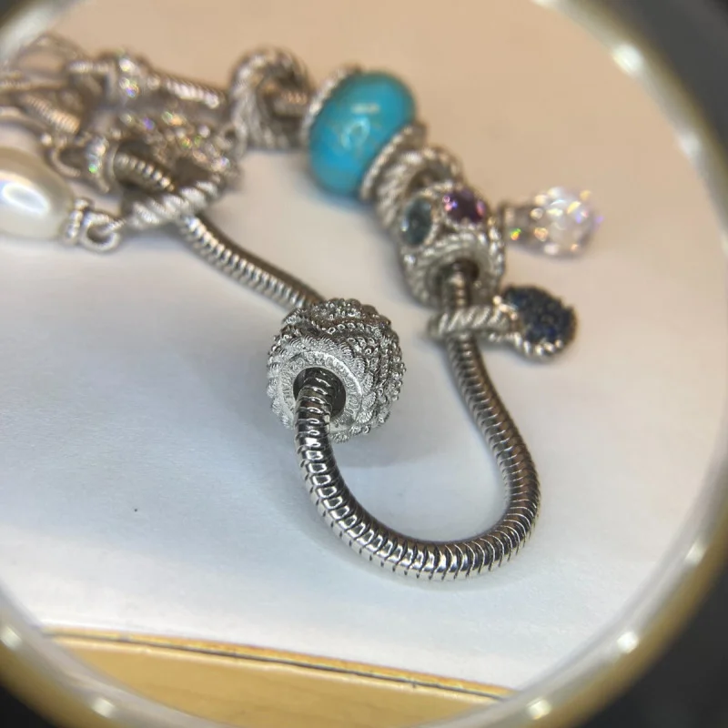 Judith Ripka Silver 925 CZ Charms Bracelet Size 7.5” Long, 7 pieces, Pouch, Box