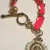 Juicy Couture Gold Tone Link With Charm Pink Lace Bracelet