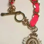 Juicy Couture Gold Tone Link With Charm Pink Lace Bracelet