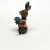 BUNNY FIGURINES SET ONE HAS FLOWERS IN HAND