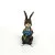 BUNNY FIGURINES SET ONE HAS FLOWERS IN HAND