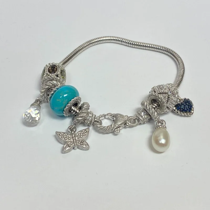 Judith Ripka Silver 925 CZ Charms Bracelet Size 7.5” Long, 7 pieces, Pouch, Box