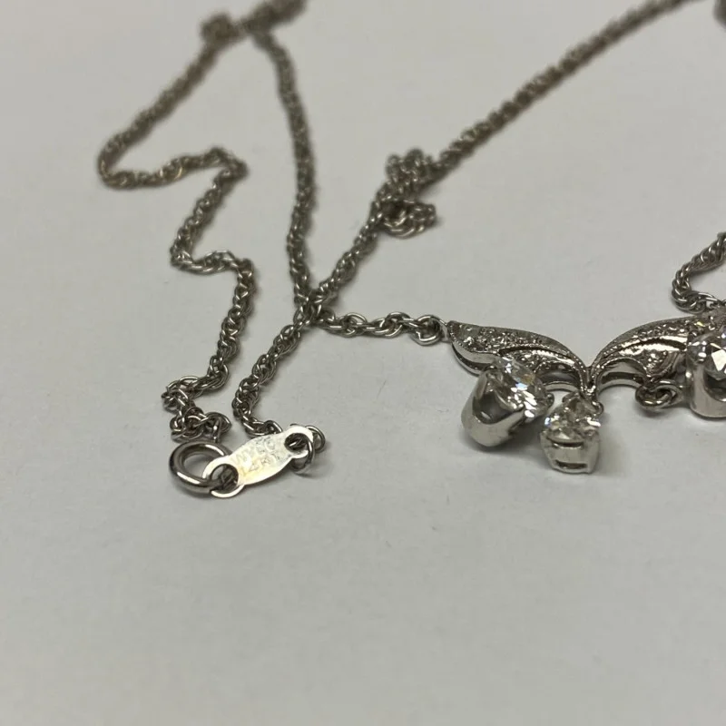 Diamond Pendant With A Neck Chain. Mounting is Made of 14 Kt Gold