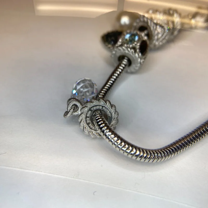 Judith Ripka Silver 925 CZ Charms Bracelet Size 7.5” Long, 7 pieces, Pouch, Box