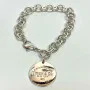 Tiffany & Co. Sterling Silver Round Tag Link Bracelet