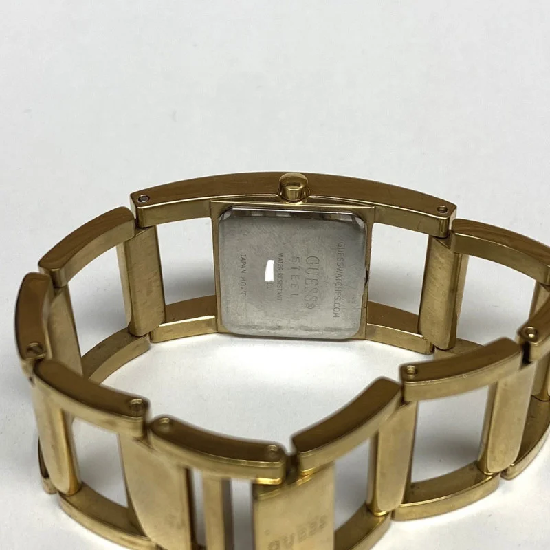 GUESS GOLD TONE WATCH GUESS STEEL WATER RESISTANT JAPAN MOVT