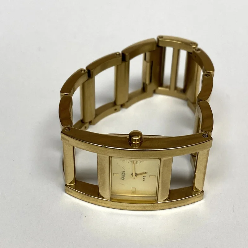 GUESS GOLD TONE WATCH GUESS STEEL WATER RESISTANT JAPAN MOVT
