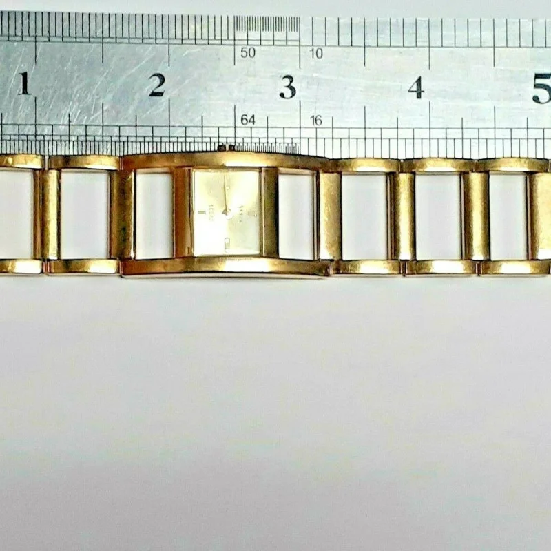GUESS GOLD TONE WATCH GUESS STEEL WATER RESISTANT JAPAN MOVT