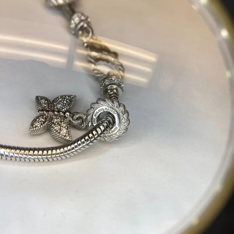 Judith Ripka Silver 925 CZ Charms Bracelet Size 7.5” Long, 7 pieces, Pouch, Box