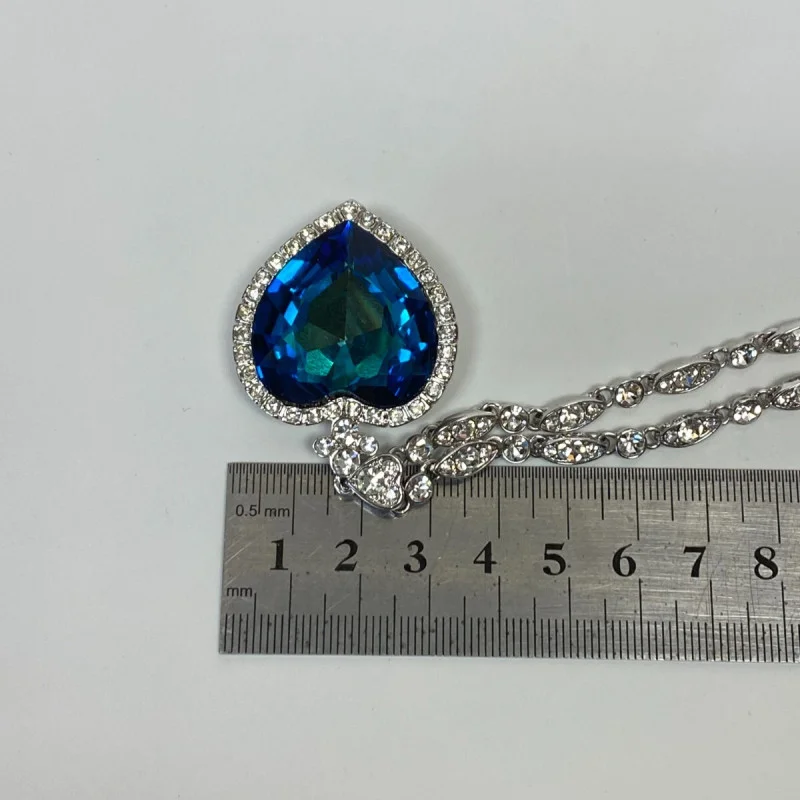 Heart-Shaped Blue Glass Pendant Necklace with Silver-Tone Chain - Elegant Design