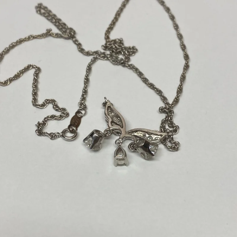 Diamond Pendant With A Neck Chain. Mounting is Made of 14 Kt Gold