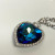 Heart-Shaped Blue Glass Pendant Necklace with Silver-Tone Chain - Elegant Design Heart-Shaped Blue Glass Pendant Necklace with Silver-Tone Chain - Elegant Design
