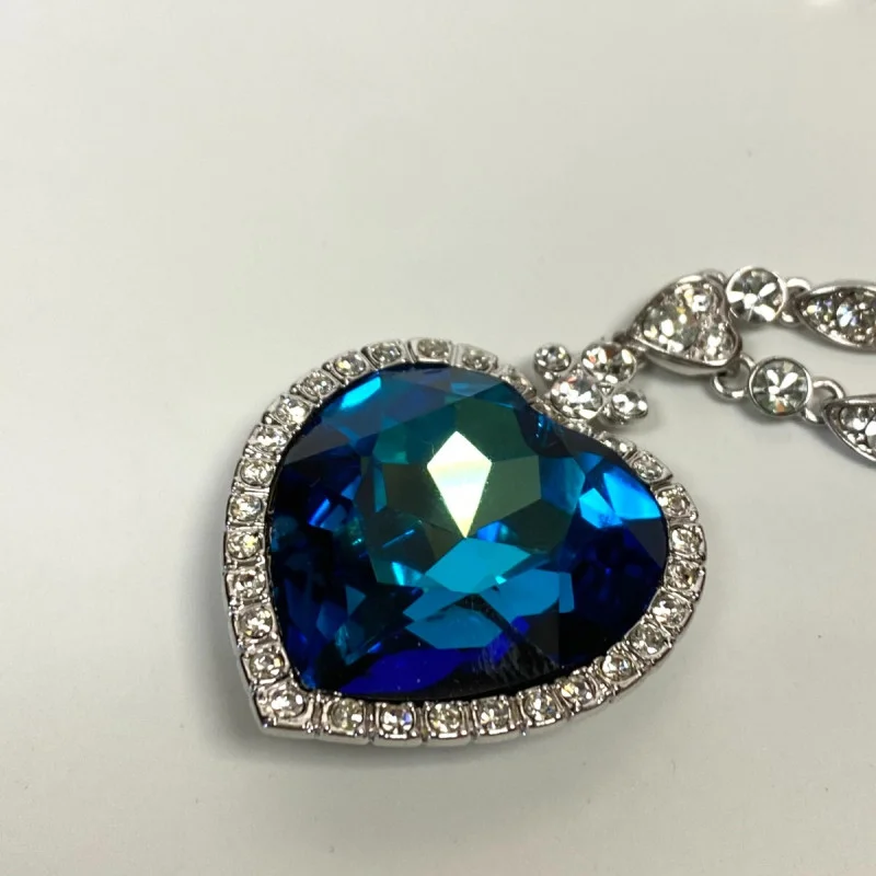 Heart-Shaped Blue Glass Pendant Necklace with Silver-Tone Chain - Elegant Design