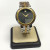 MOVADO TWO-TONE STAINLESS STEEL QUARTZ WOMENS WATCH WITH BOX, 35mm