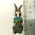 BUNNY FIGURINES SET ONE HAS FLOWERS IN HAND BUNNY FIGURINES SET ONE HAS FLOWERS IN HAND