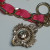 Juicy Couture Gold Tone Link With Charm Pink Lace Bracelet