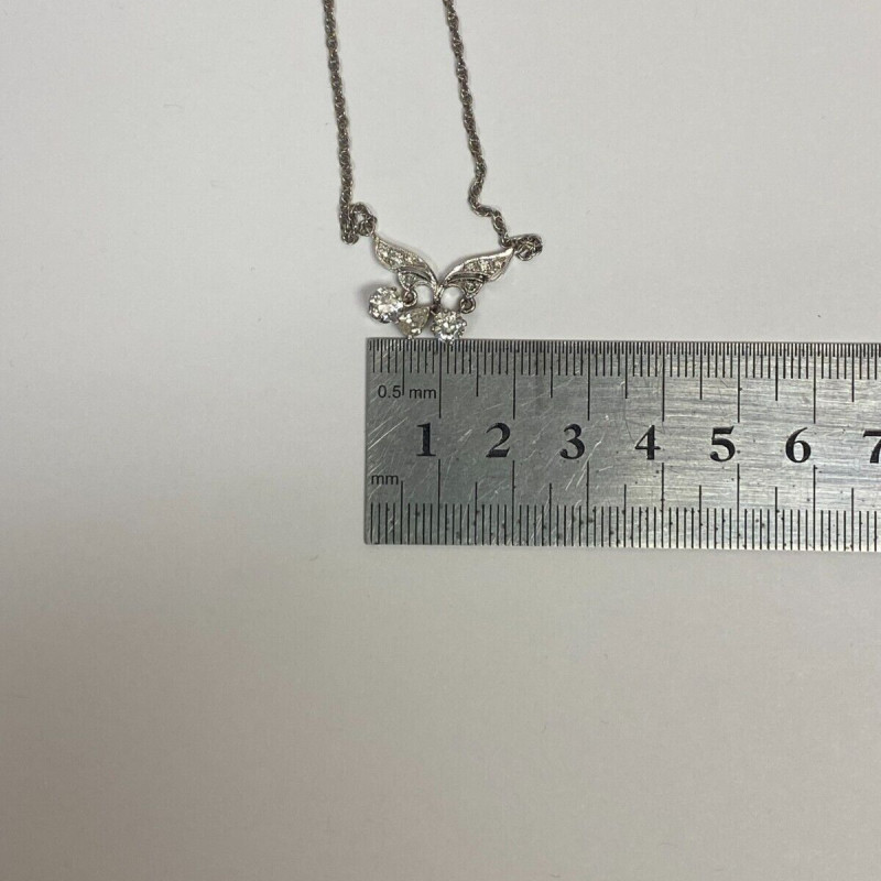 Diamond Pendant With A Neck Chain. Mounting is Made of 14 Kt Gold Diamond Pendant With A Neck Chain. Mounting is Made of 14 Kt Gold