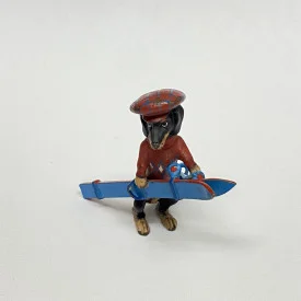 1 3/4 LONG DOGGY WITH RED HAT , RED SWEATER WITH BLUE SKI DECOR FOR TABLE
