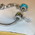 Judith Ripka Silver 925 CZ Charms Bracelet Size 7.5” Long, 7 pieces, Pouch, Box Judith Ripka Silver 925 CZ Charms Bracelet Size 7.5” Long, 7 pieces, Pouch, Box