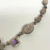 NICKY BUTLER STERLING UNUSUAL FESTOON DRAPE MOONSTONE, GARNET 17 NECKLACE