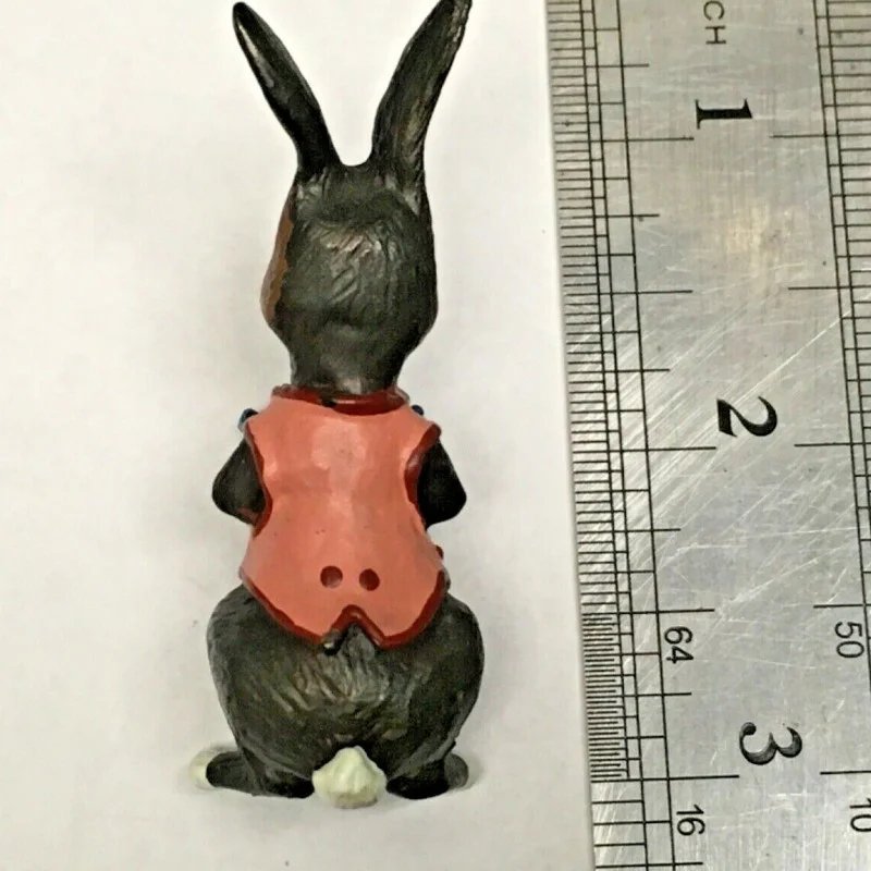 BUNNY FIGURINES SET ONE HAS FLOWERS IN HAND