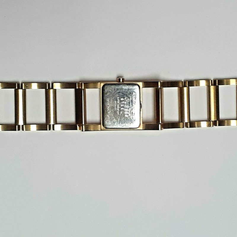 GUESS GOLD TONE WATCH GUESS STEEL WATER RESISTANT JAPAN MOVT GUESS GOLD TONE WATCH GUESS STEEL WATER RESISTANT JAPAN MOVT