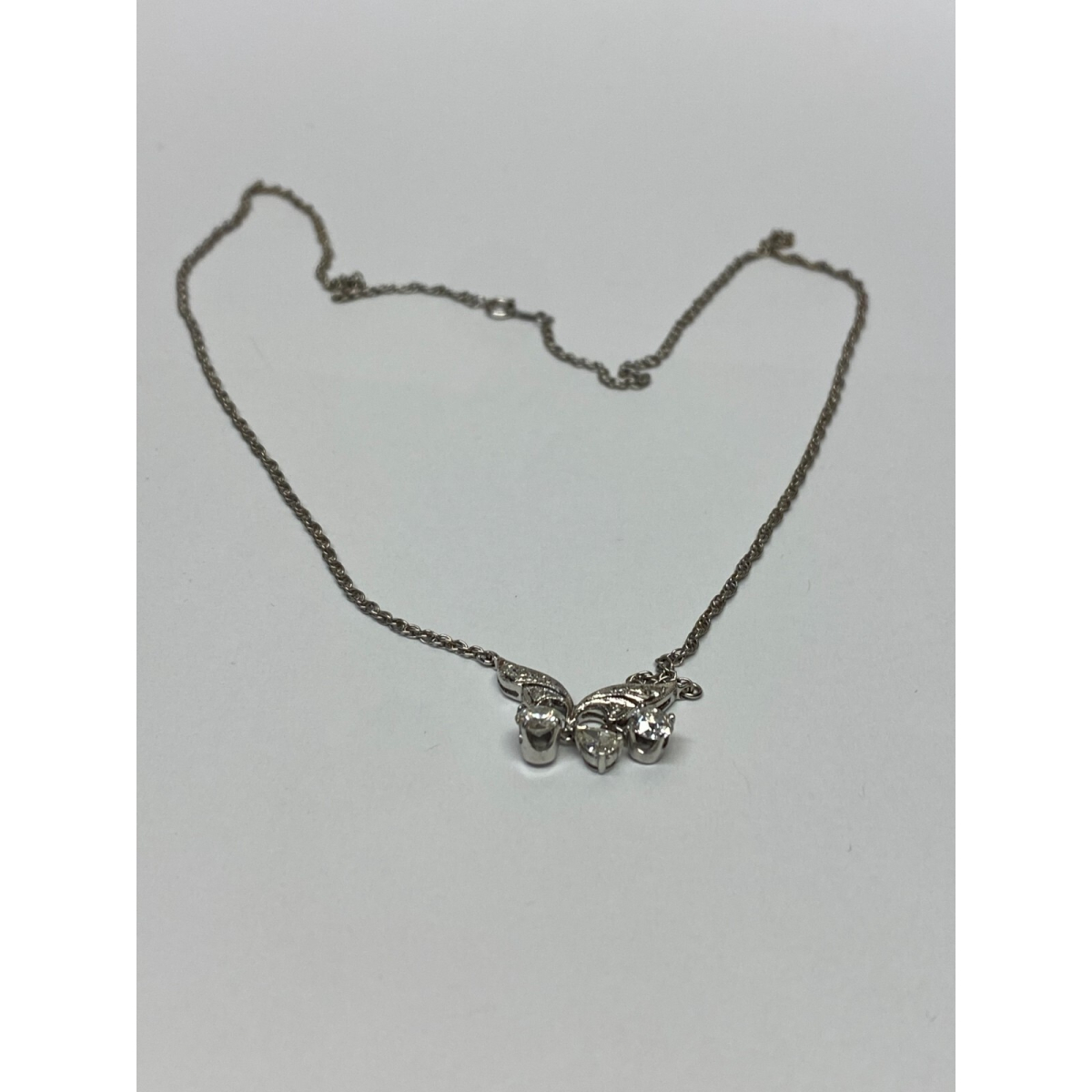 Diamond Pendant With A Neck Chain. Mounting is Made of 14 Kt Gold