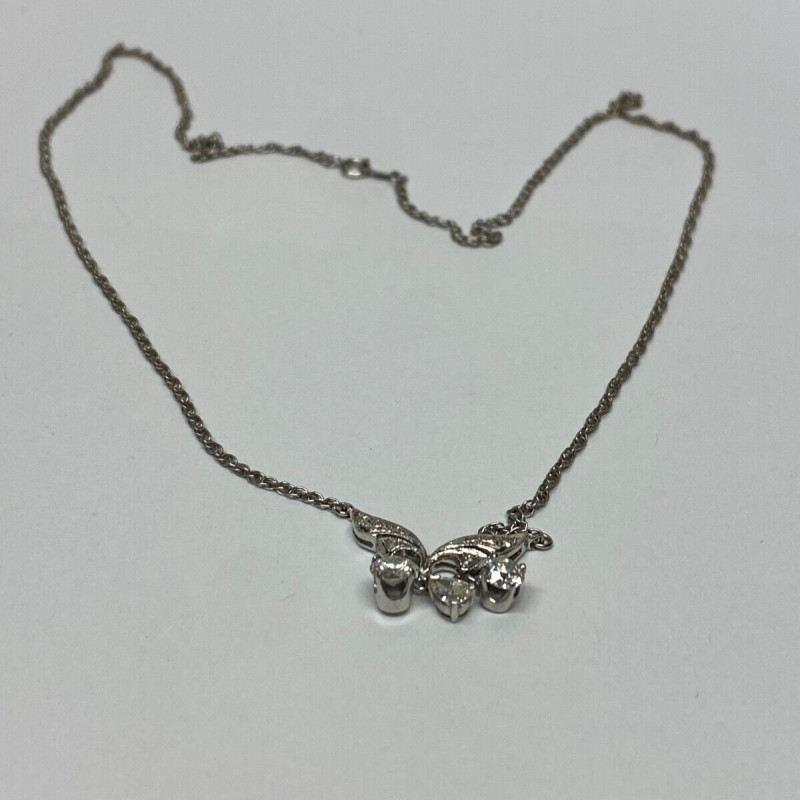 Diamond Pendant With A Neck Chain. Mounting is Made of 14 Kt Gold Diamond Pendant With A Neck Chain. Mounting is Made of 14 Kt Gold