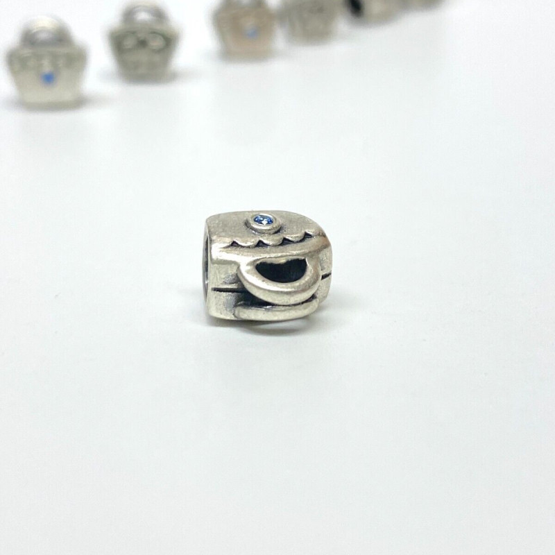 Authentic Pandora Silver Blue CZ Scalloped Purse Bead 790473CZB | RETIRED Authentic Pandora Silver Blue CZ Scalloped Purse Bead 790473CZB | RETIRED