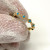 Shashi Gold Toned Ring with Blue stones, size 6 Shashi Gold Toned Ring with Blue stones, size 6